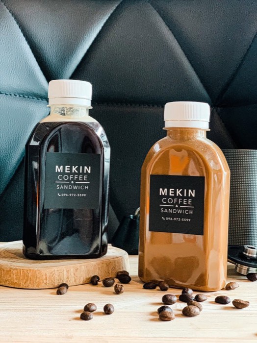 Bottled Mekin cold brew and iced coffee drinks with brand label