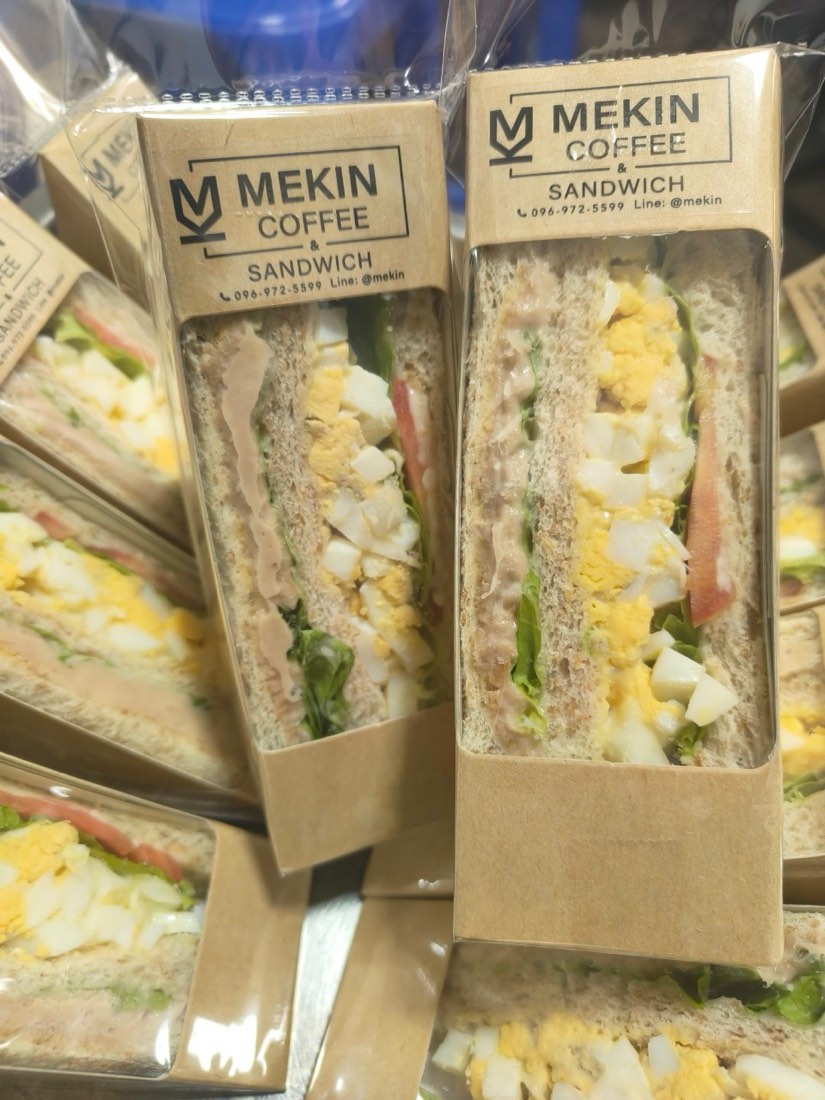 Boxed sandwiches prepared for a business meeting