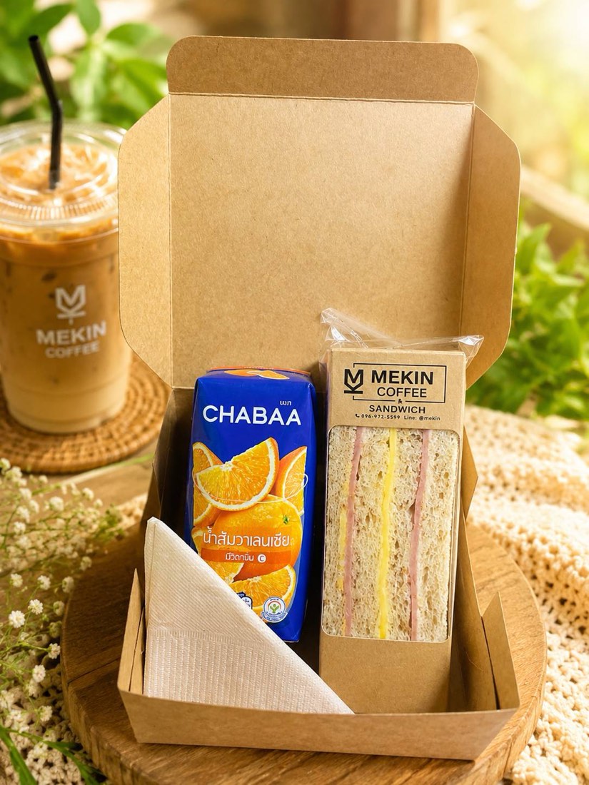 Mekin sandwich box with Chabaa orange juice and iced coffee