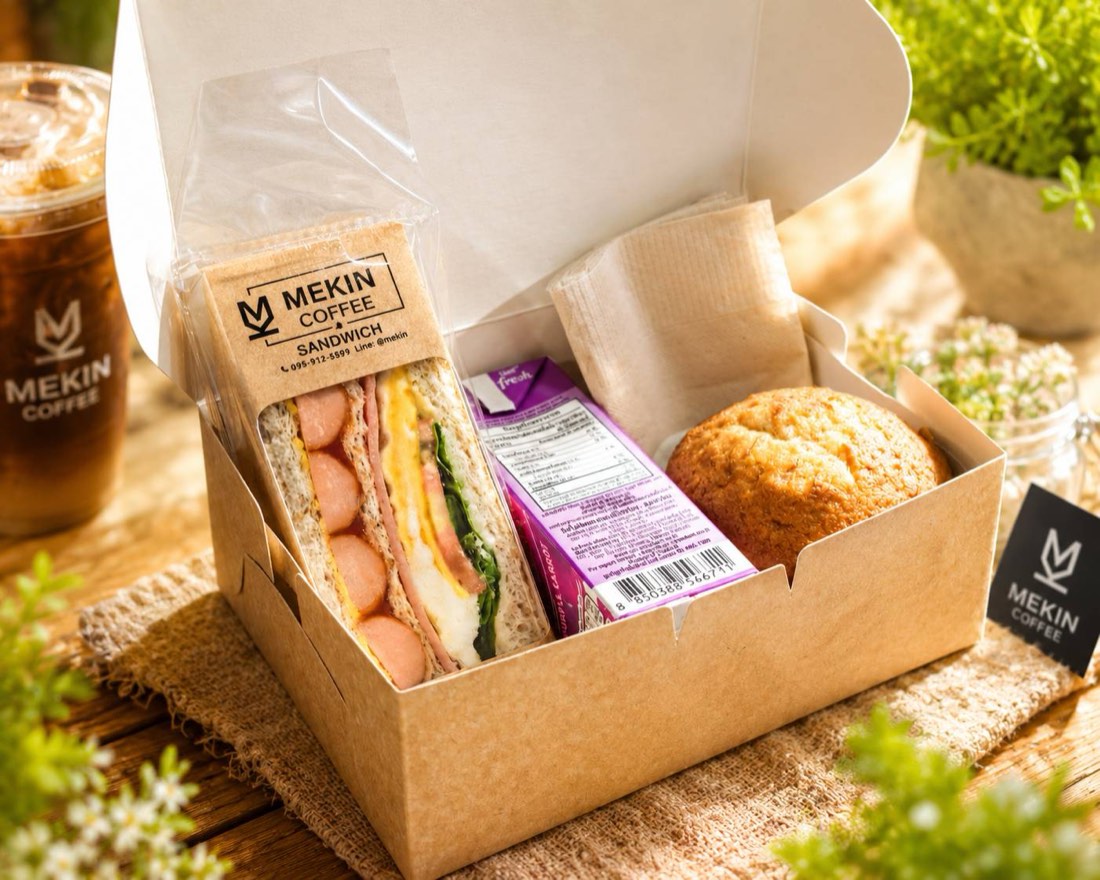 Mekin breakfast box with sandwich, muffin, juice and iced coffee